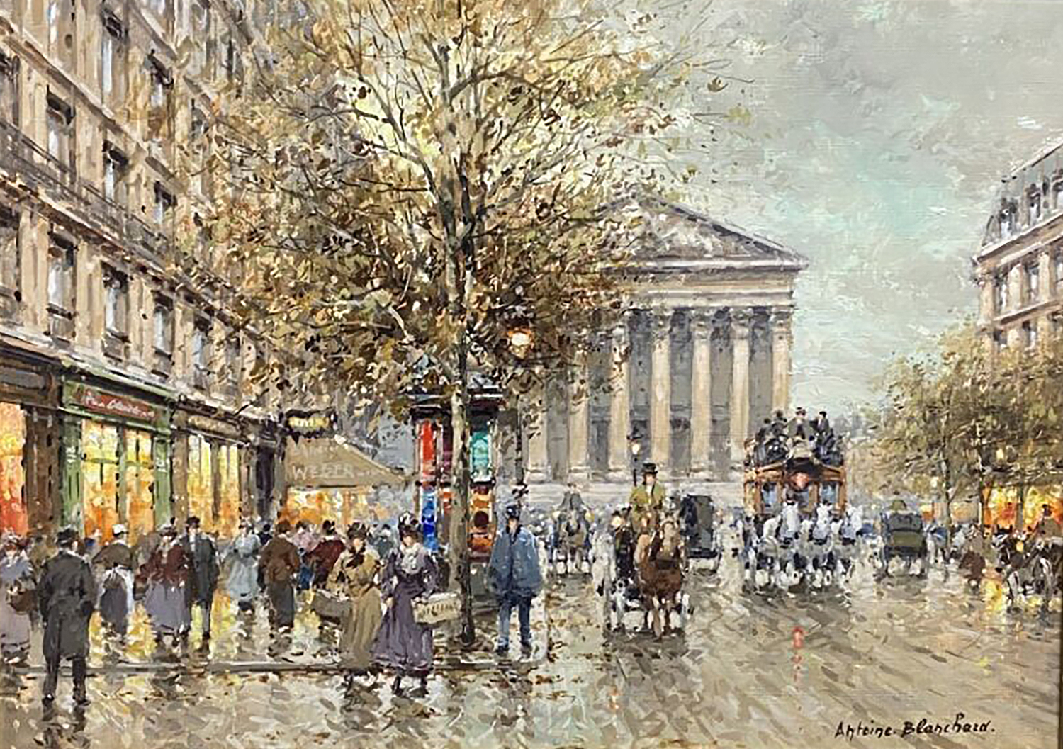 street scene in paris of the Madeleine from Rue Royale